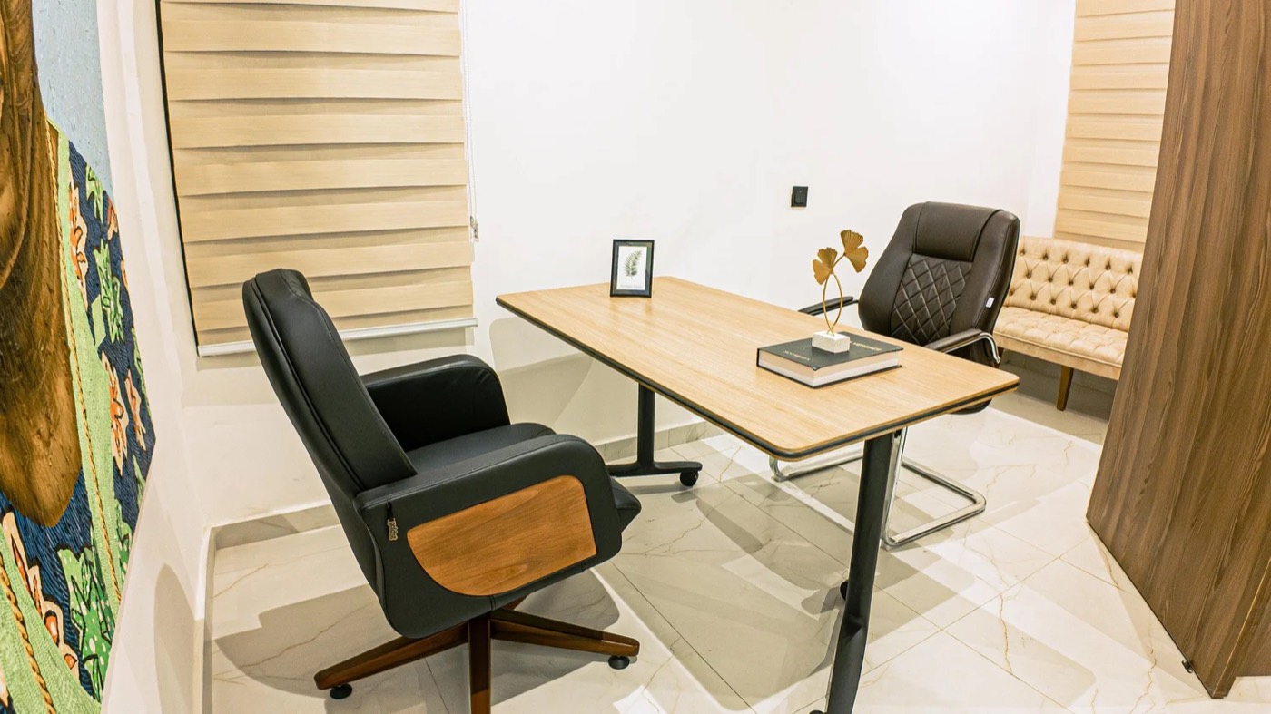 Purpose-built home office in a delivered Golf View residence, with desk and seating